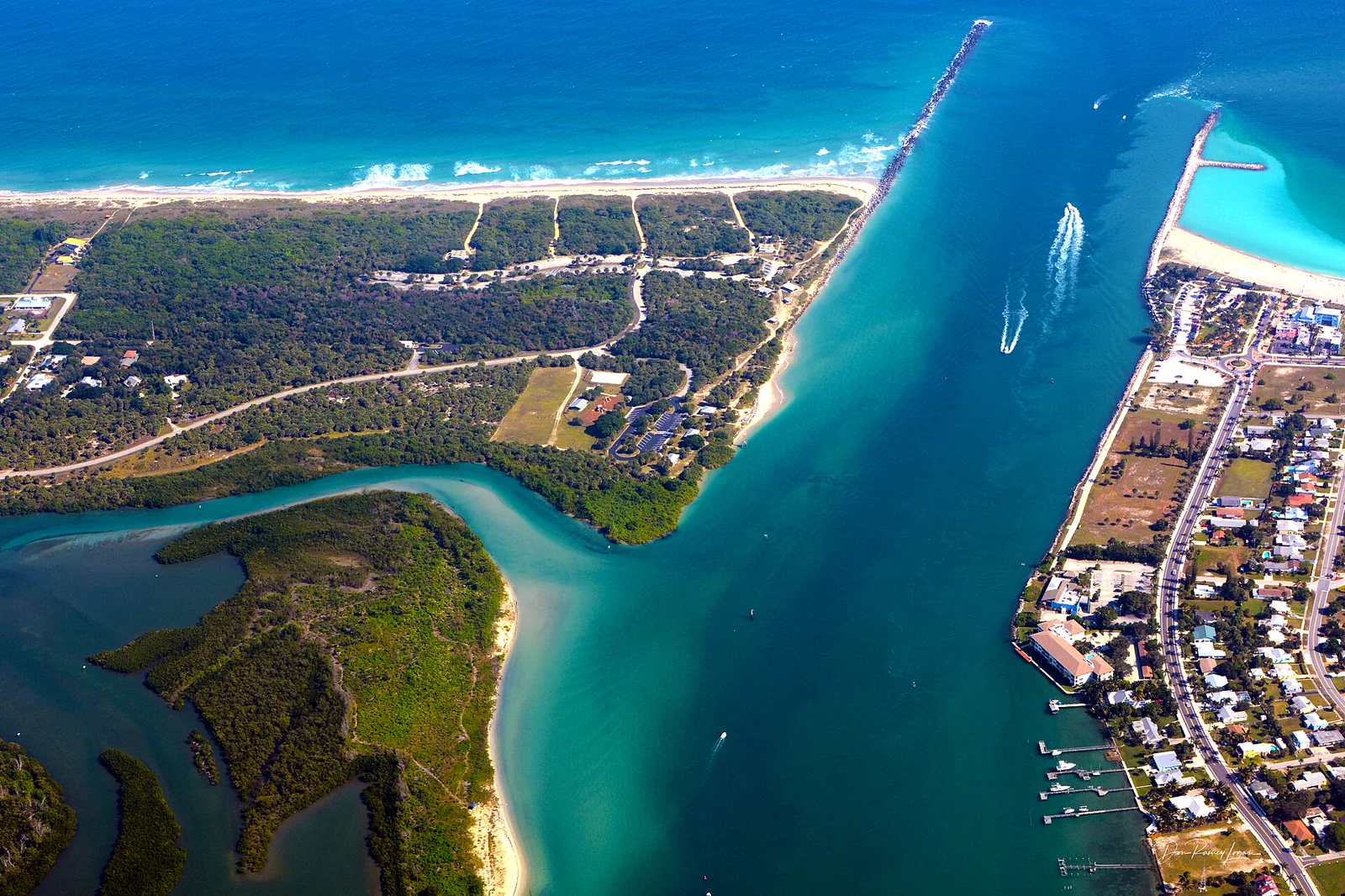 Aerial view of the Fort Pierce Inlet, Fort Pierce, Florida — the jetties, the beach and the Indian River Lagoon.